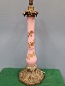 A 19th C. FRENCH ORMOLU MOUNTED PINK GLASS COLUMNAR TABLE LAMP GILT WITH A SPIRAL OF VINES ABOVE THE
