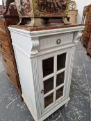 AN ANTIQUE GLAZED PAINTED SIDE CABINET WITH MARBLE TOP.