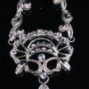AN ITALIAN WHITE GOLD AND STONE SET LAVALIER TYPE NECKLACE. THE CENTRE PIECE AND THE CHAIN BOTH