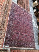 AN ANTIQUE PERSIAN TRIBAL CARPET 397 x 282 cm