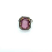 A DIAMOND AND PINK SYNTHETIC SPINEL LARGE COCKTAIL RING, THE CENTRAL PINK STONE FACET CUT HELD