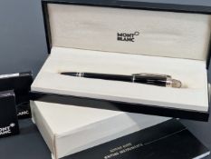A MONT BLANC SKYWALKER FOUNTAIN PEN, COMPLETE WITH SPARE MYSTERY BLACK INK CARTRIDGES.