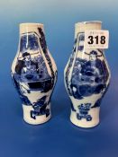 A PAIR OF CHINESE BLUE AND WHITE VASES, THE CENTRALLY SWOLLEN CYLINDRICAL SHAPES EACH PAINTED WITH A