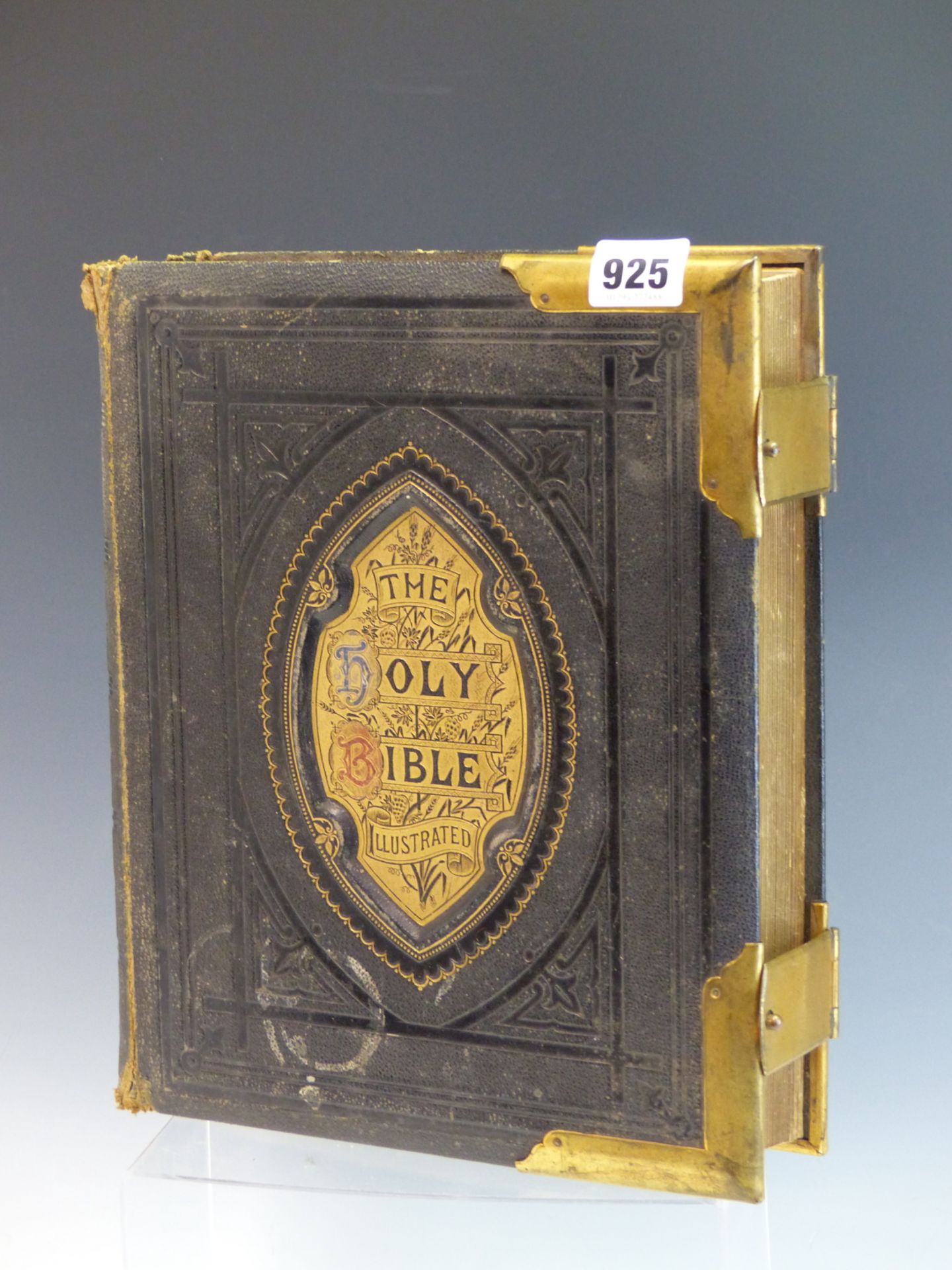 TWO ANTIQUE FAMILY BIBLES, ONE DATED 1819, THE SECOND WITH DECORATIVE EMBOSSED BINDING AND BRASS