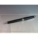 A MONT BLANC MEISTERSTUCK BALL POINT PEN. THE CAP BAND INSCRIBED 75 YEARS OF PASSION.