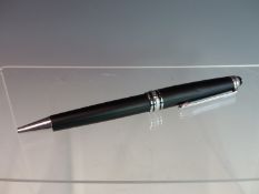 A MONT BLANC MEISTERSTUCK BALL POINT PEN. THE CAP BAND INSCRIBED 75 YEARS OF PASSION.