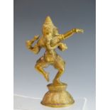 A CAST BRASS INDIAN FIGURE OF THE GOD GANESHA (20TH CENTURY) 21 cm HIGH.