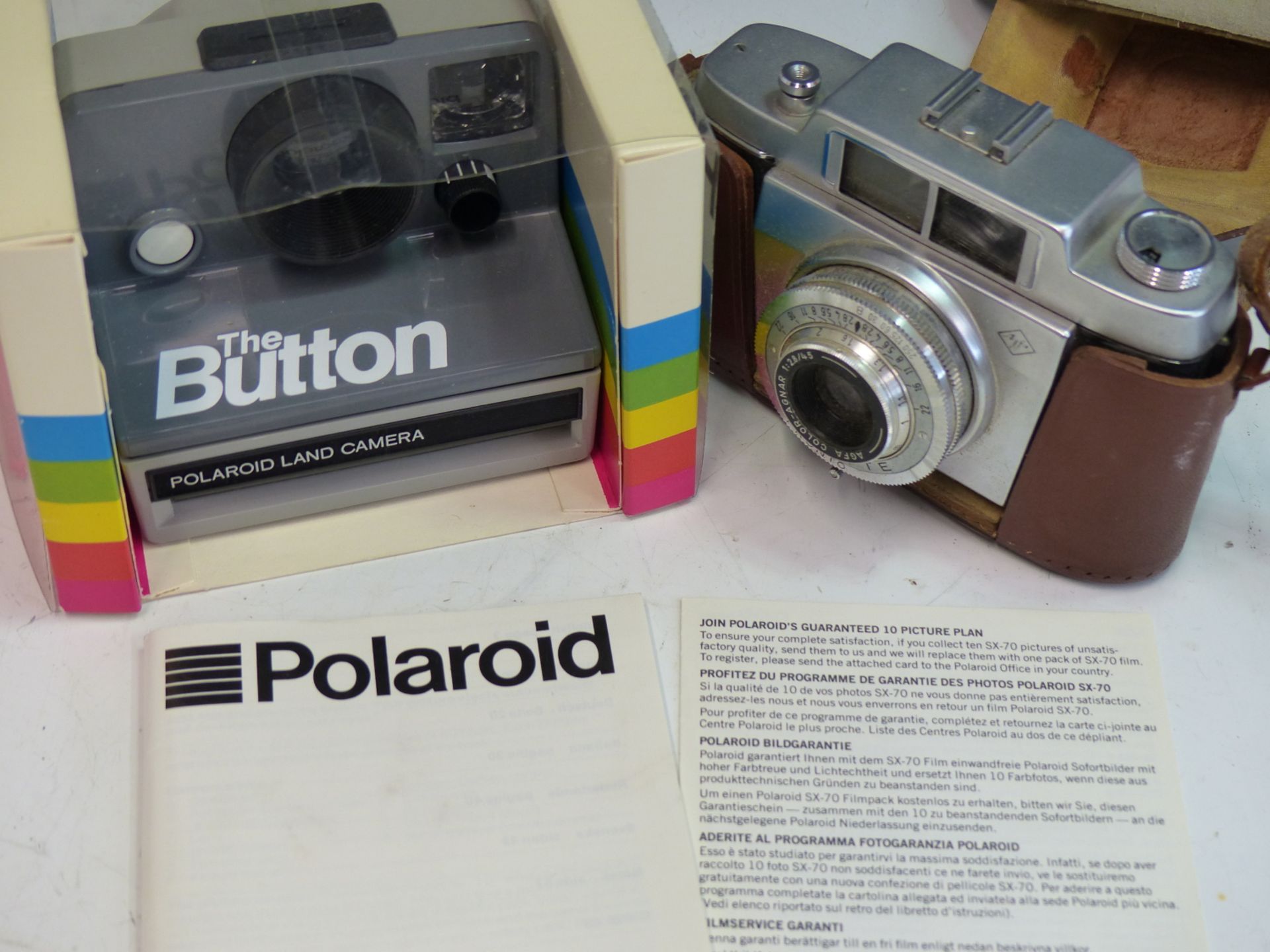 A POLAROID LAND CAMERA "THE BUTTON" IN ORIGINAL PACKAGING WITH MANUAL. TOGETHER WITH AN AGFA SILETTE - Image 3 of 3
