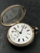 A VICTORIAN HALLMARKED SILVER OPEN FACED POCKET WATCH. DATED 1891, LONDON. THE MOVEMENT SIGNED ISAAC