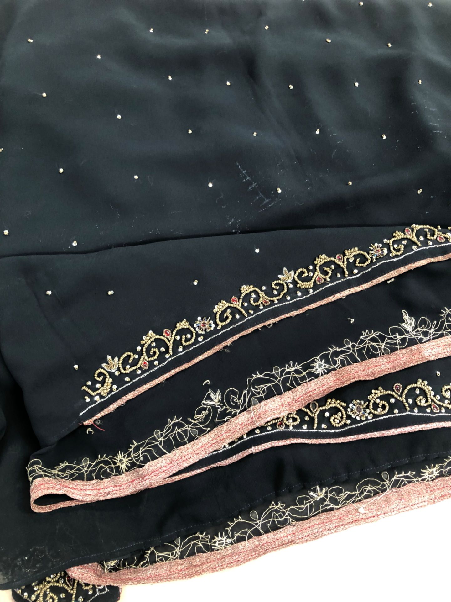 A BLACK CREPE SARI WITH BEAD WORK AND SEQUIN DECORATION, A PINK SARI WITH SILVER THREAD WORK - Image 5 of 5