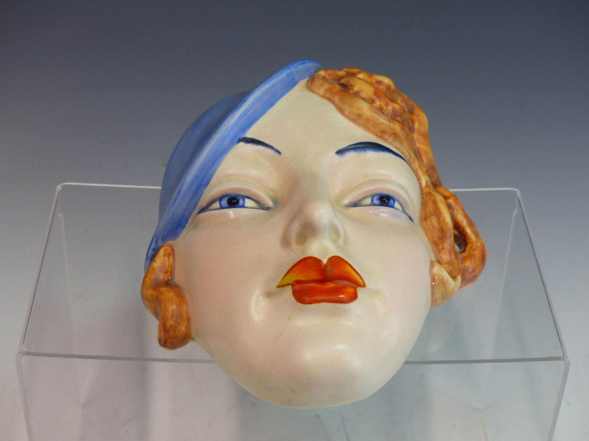 AN ART DECO POTTERY WALL MASK OF A YOUNG WOMAN WITH BLUE HAT. PROBABLY BY BESWICK. IMPRESSED MARKS - Image 2 of 3