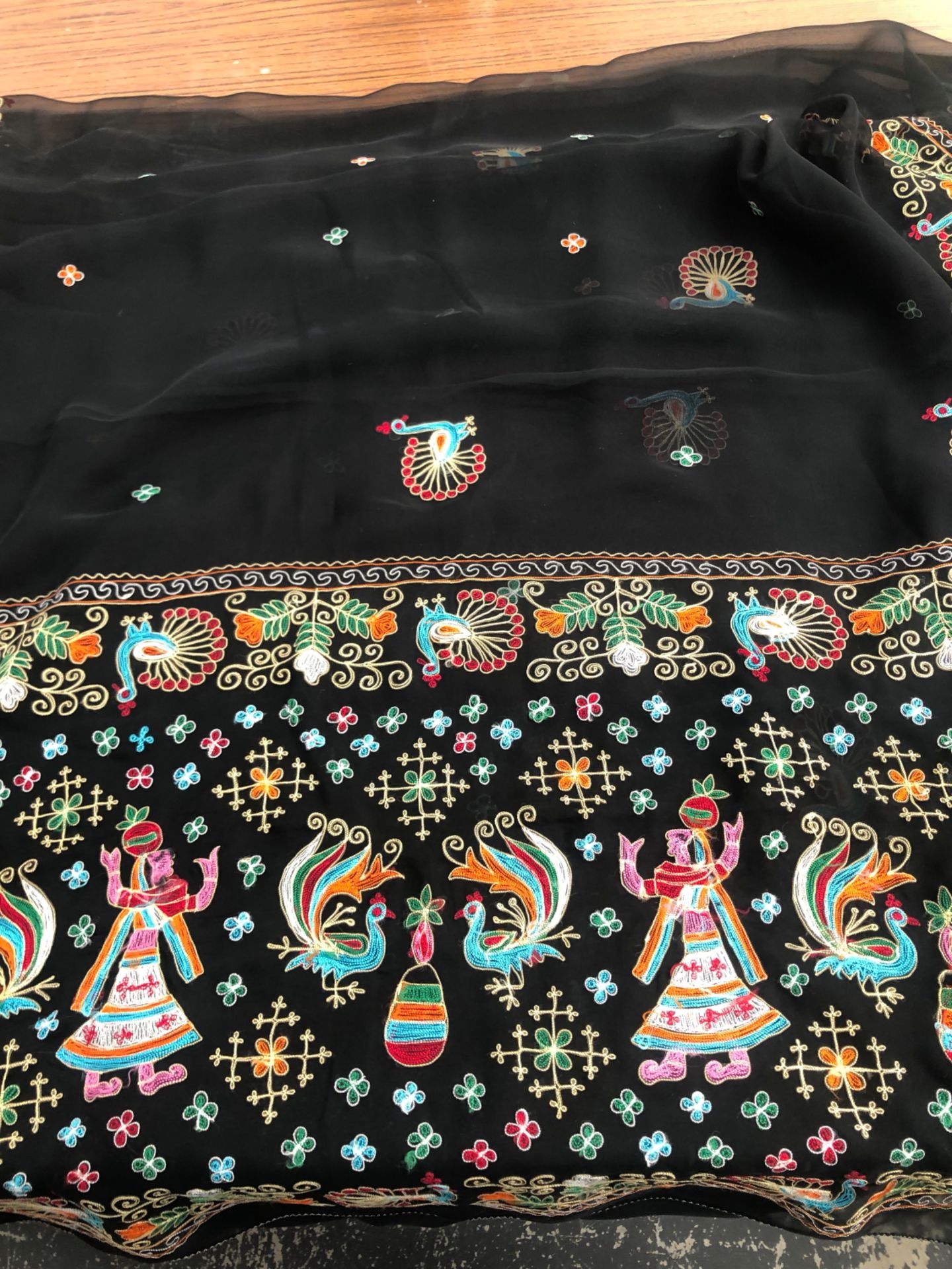 A BLACK CREPE SARI WITH BEAD WORK AND SEQUIN DECORATION, A PINK SARI WITH SILVER THREAD WORK