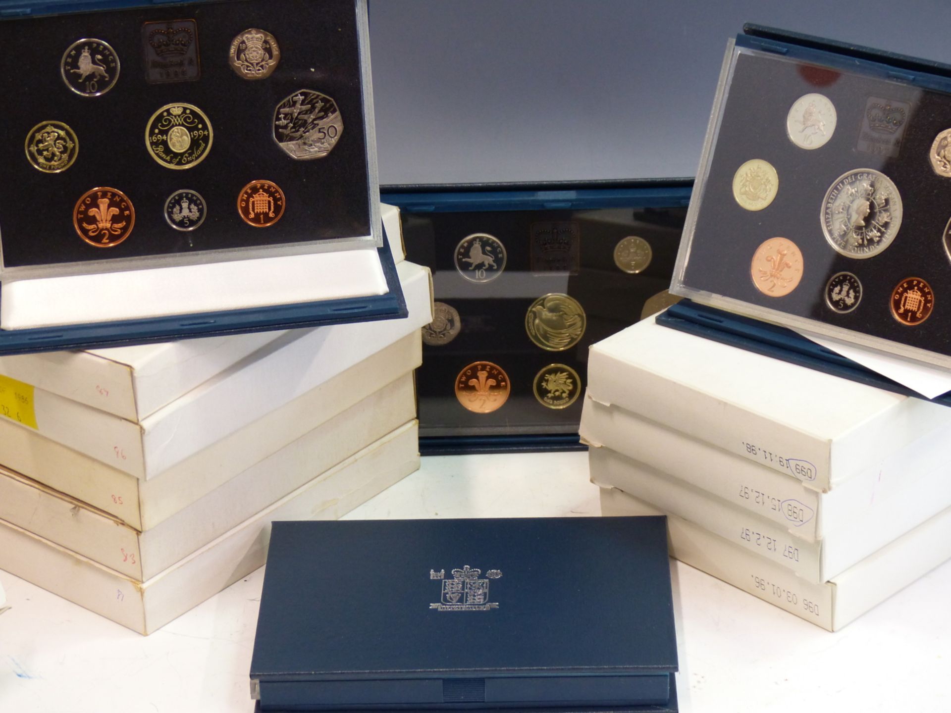 COINS- SEVENTEEN UN-CIRCULATED PROOF COIN YEAR PACKS 1981 PLUS 1983- 1999. ROYAL MINT.