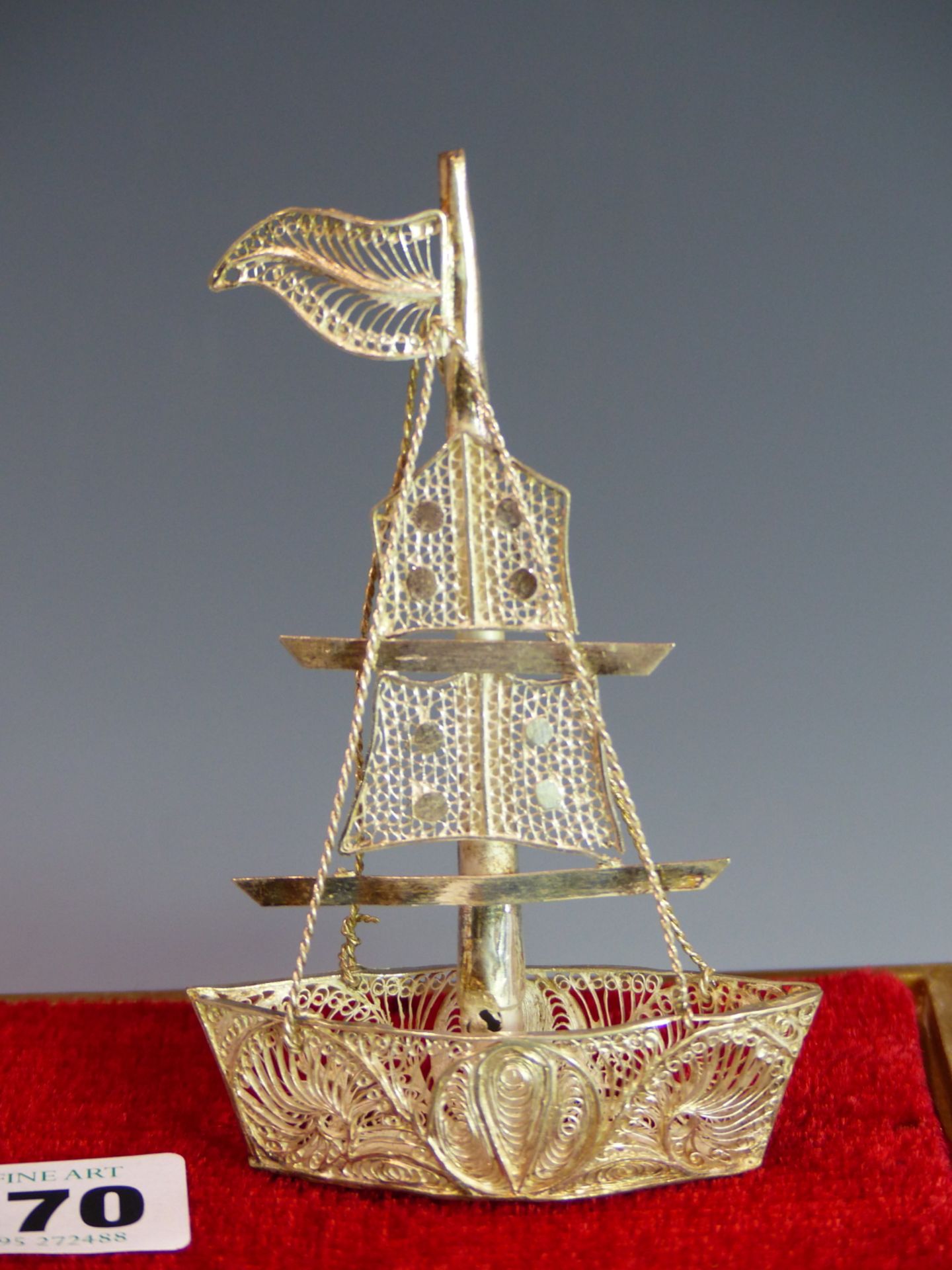 AN EASTERN SILVER FILIGREE MODEL OF A SAILING VESSEL. NO ASSAY MARKS ASSESSED AS 930 SILVER. 35. - Image 2 of 2