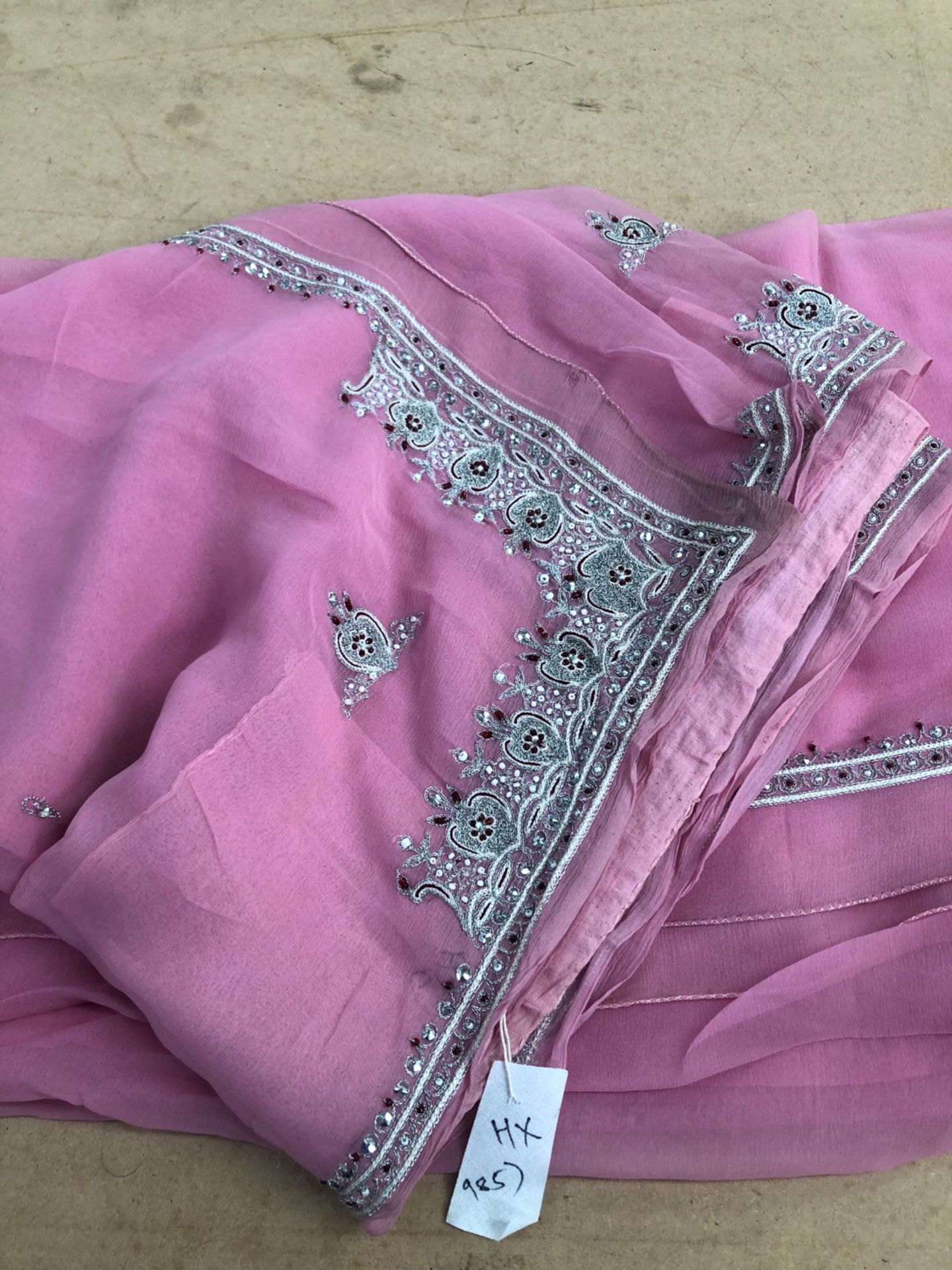 A BLACK CREPE SARI WITH BEAD WORK AND SEQUIN DECORATION, A PINK SARI WITH SILVER THREAD WORK - Image 4 of 5