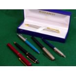 A WATERMANS ROLLER BALL PEN IN ORIGINAL PRESENTATION BOX TOGETHER WITH TWO PARKER EXAMPLES, A