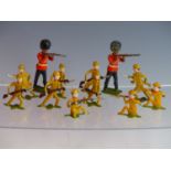 TEN VINTAGE JAPANESE DIE CAST SOLDIER FIGURES TOGETHER WITH TWO OTHERS OF BRITISH RIFLEMEN.