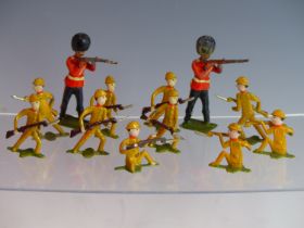TEN VINTAGE JAPANESE DIE CAST SOLDIER FIGURES TOGETHER WITH TWO OTHERS OF BRITISH RIFLEMEN.