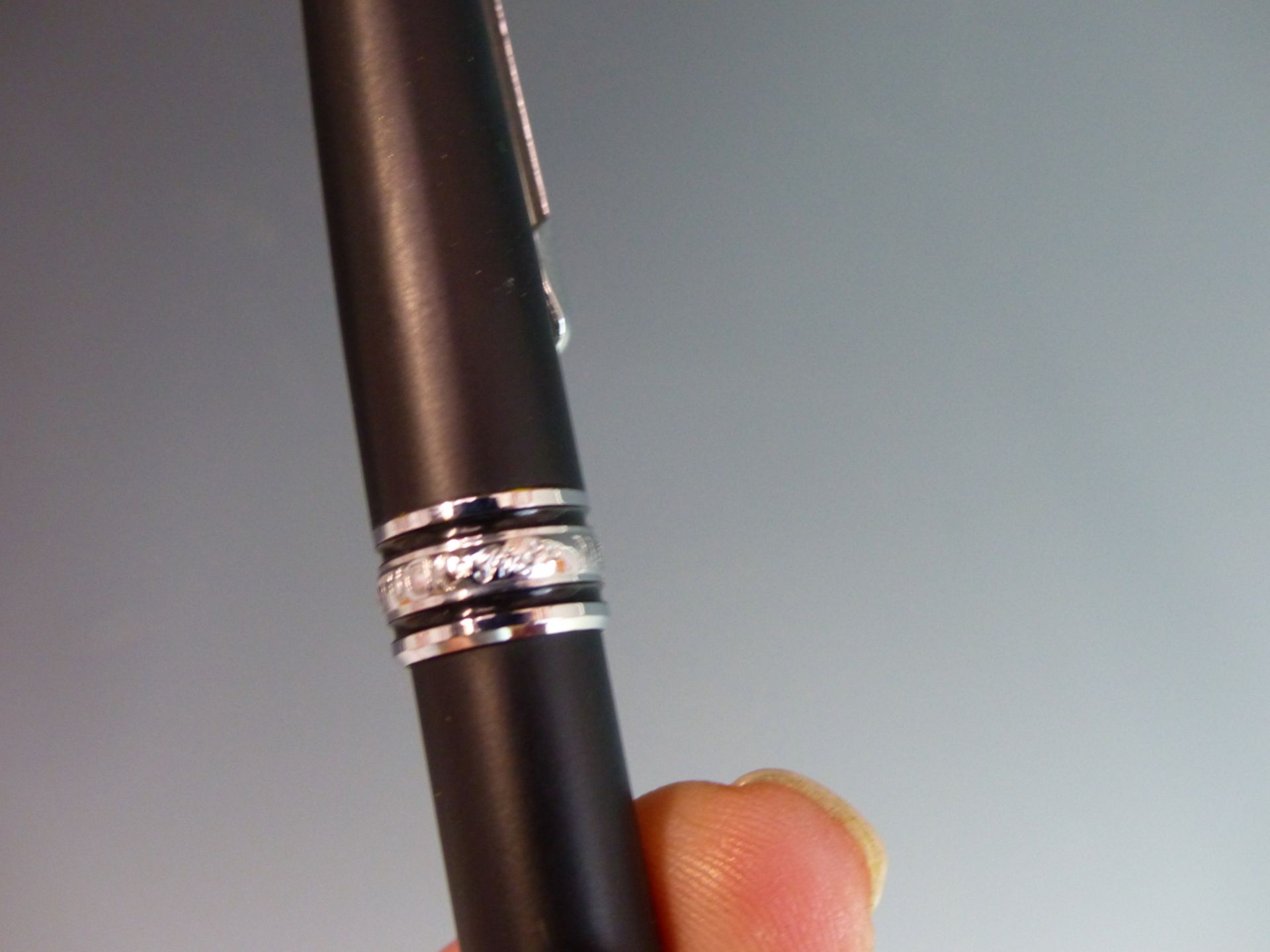 A MONT BLANC MEISTERSTUCK BALL POINT PEN. THE CAP BAND INSCRIBED 75 YEARS OF PASSION. - Image 5 of 5