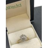 A 9ct HALLMARKED GOLD VINTAGE DIAMOND CLUSTER RING DATED 1985. FINGER SIZE N 1/2, WEIGHT 2.28grms.