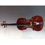 A 20TH CENTURY VIOLIN WITH LABEL " ANTONIUS STRADIUARIUS CREMONENSIS". CASED WITH A SILVER PLATE