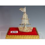 AN EASTERN SILVER FILIGREE MODEL OF A SAILING VESSEL. NO ASSAY MARKS ASSESSED AS 930 SILVER. 35.