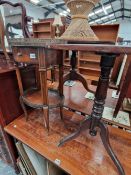 A FRENCH STYLE TWO TIER TABLE AND A TRIPOD TABLE