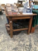 AN ANTIQUE PINE REFECTORY TYPE TABLE