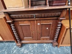 A CONTINENTAL OAK SIDE CABINET