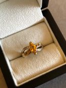 A 9ct GOLD HALLMARKED MARQUISE GEMSET AND DIAMOND CHANNEL SET RING. FINGER SIZE N. WEIGHT 3.84grms