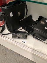 TWO CASES OF BINOCULARS FROM TESCO AND BOOTS TOGETHER WITH A PAIR OF OPERA GLASSES