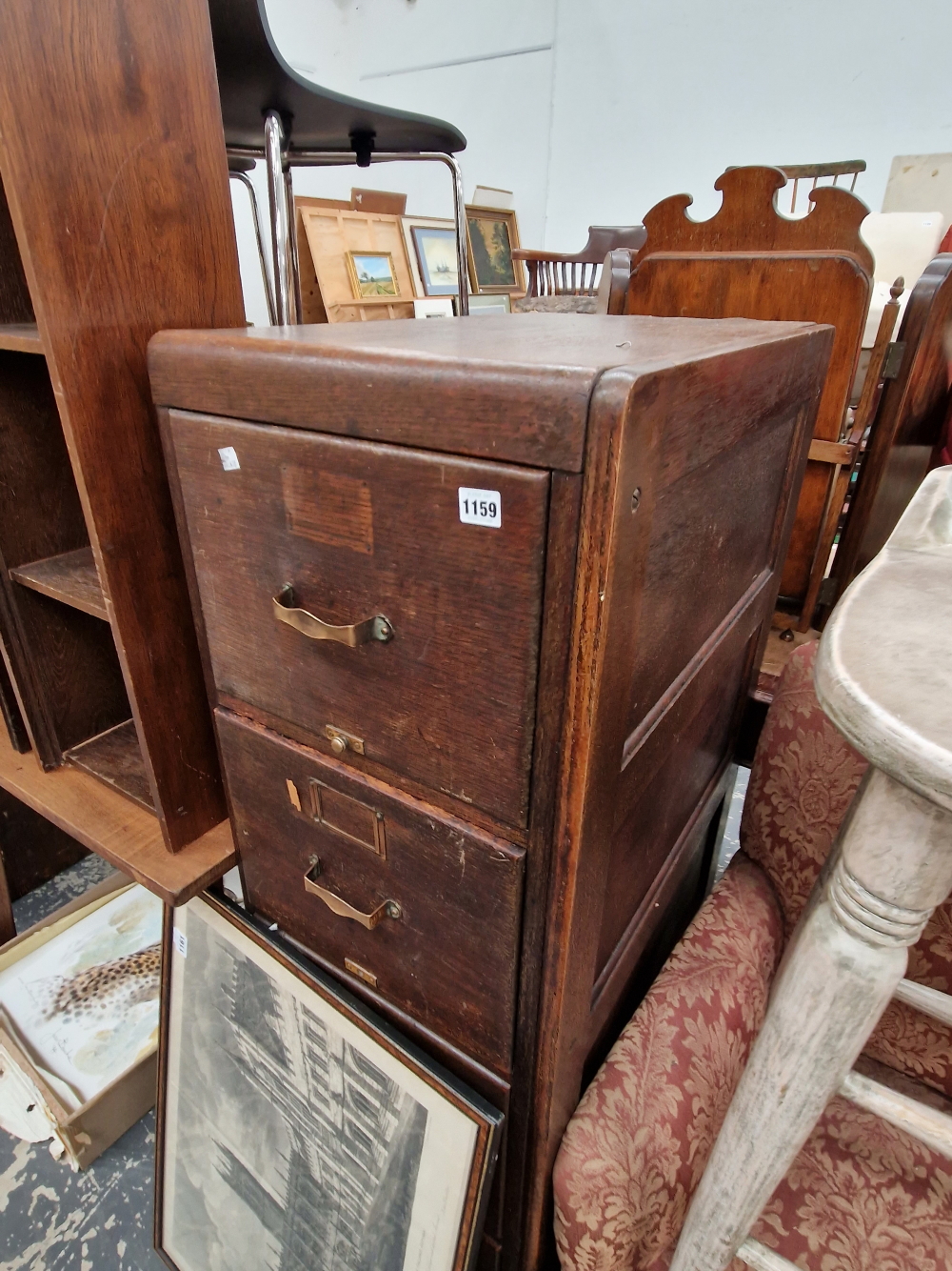 AN OAK FILING CABINET