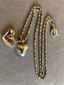 A SILVER LINKS OF LONDON LONG NECKLACE WITH TWO HEART PENDANTS ATTACHED, ONE HEART ASSESSED AS