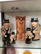 FOUR DOULTON WINSTON CHURCHILL JUGS AND A BESWICK TERRIER FIGURE.