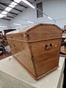 A PINE DOMED TOPPED BLANKET CHEST.