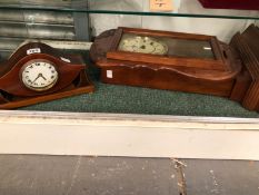 TWO MAHOGANY CASED MANTEL CLOCKS, THE LARGER STRIKING ON A COILED ROD