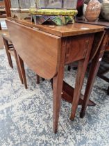 A MID-CENTURY MAHOGANY DROP LEAF TABLE