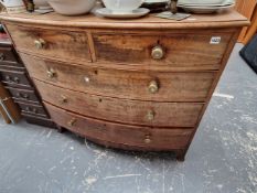 AN EARLY 19th C. MAHOGANY BOW FRONT CHEST OF DRAWERS