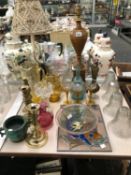 TWO TABLE LAMPS, A SET OF FOUR CUT GLASS SHADES, GLASS JUGS, A PAIR AND ANOTHER BRASS CANDLESTICK,