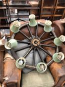 A WAGON WHEEL CHANDELIER