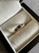 A VINTAGE 18ct GOLD SAPPHIRE AND DIAMOND BOAT SHAPE RING. STAMPED 18ct. FINGER SIZE N1/2 WEIGHT