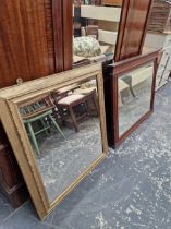 A VICTORIAN GILT FRAMED MIRROR AND A LATER MAHOGANY FRAMED MIRROR