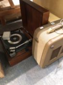 A RECORD PLAYER, A REEL TO REEL TAPE PLAYER AND A SEWING MACHINE.