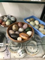 A COLLECTION OF VARIOUS STONE EGG HAND COOLERS