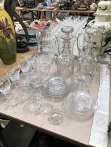 THREE DECANTERS, THREE JUGS TOGETHER WITH DRINKING GLASS