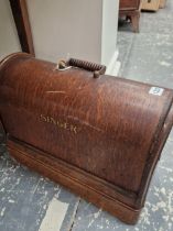 A OAK CASED SINGER SEWING MACHINE