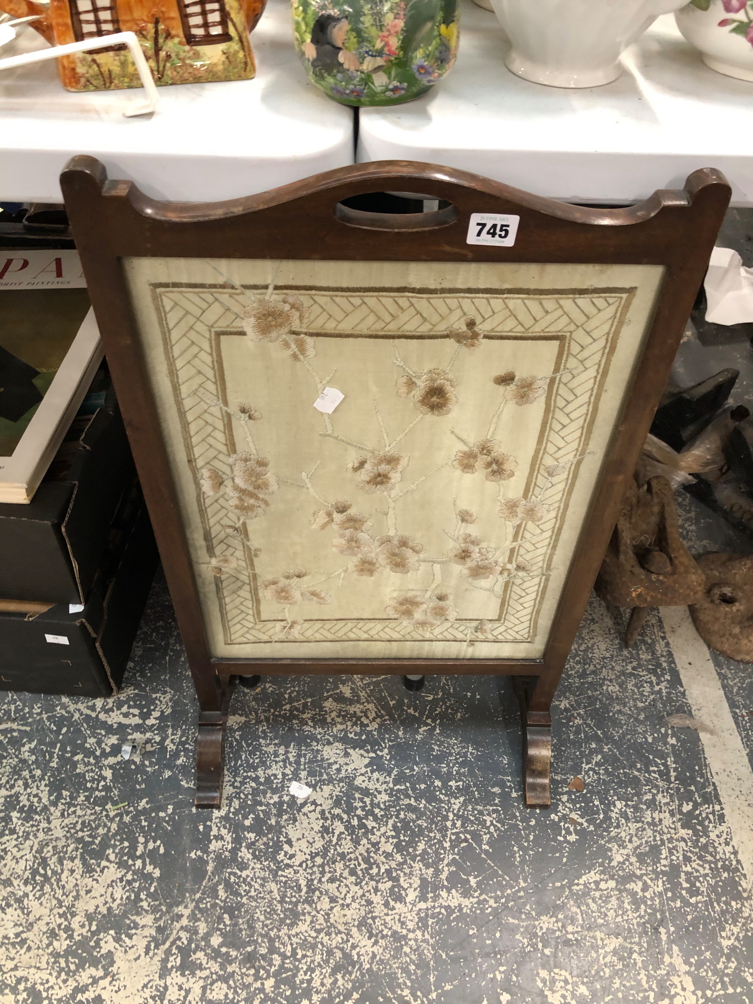 A MAHOGANY FRAMED FIRESCREEN WITH CHERRY BLOSSOM EMBROIDERED IN SILKS