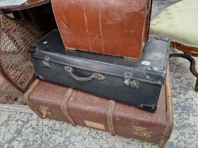 A CABIN TRUNK, A BRIEF CASE ET