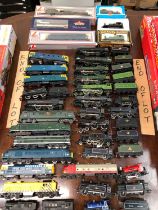 A COLLECTION OF 00 GUAGE LOCOMOTIVES WITH SOME TENDERS BY VARIOUS MAKERS TO INCLUDE: LIMA, TRIANG,