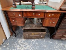 A CONTINENTAL WALNUT WRITING TABLE.